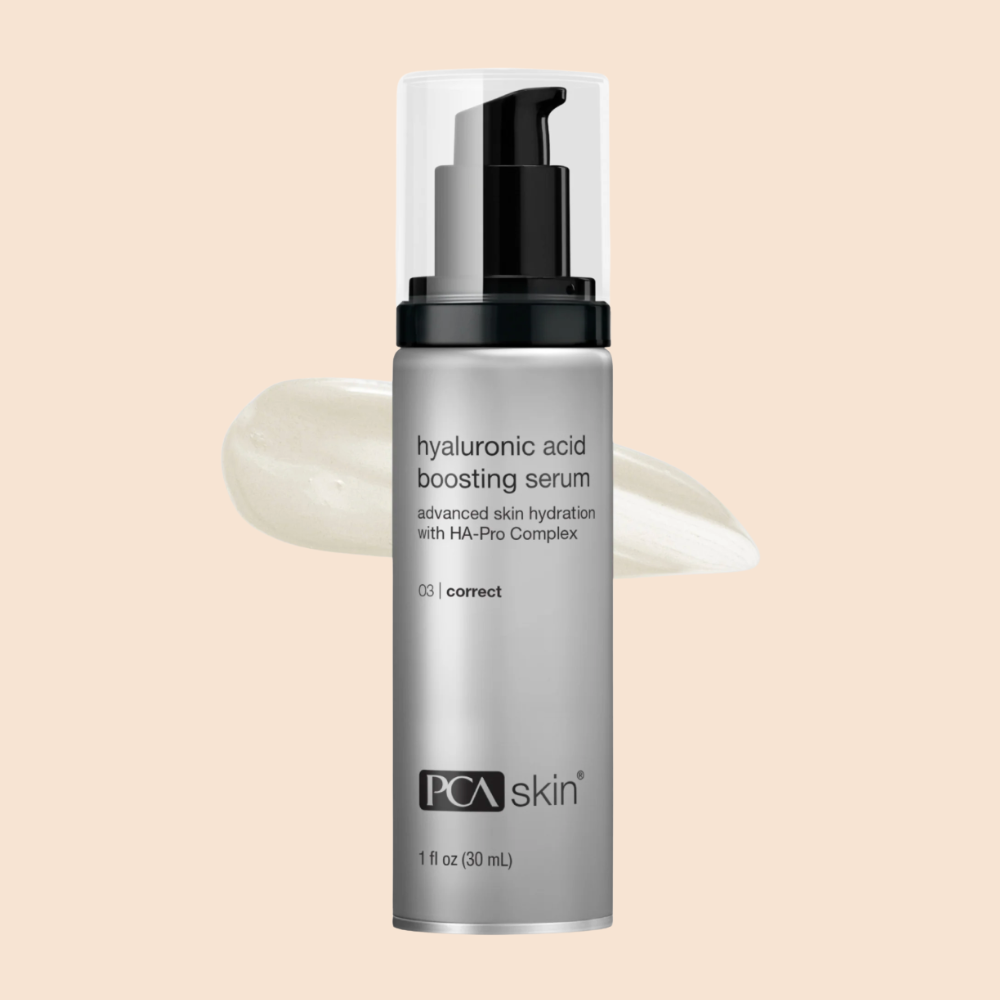 PCA Skin hyaluronic acid boosting serum bottle on a beige background