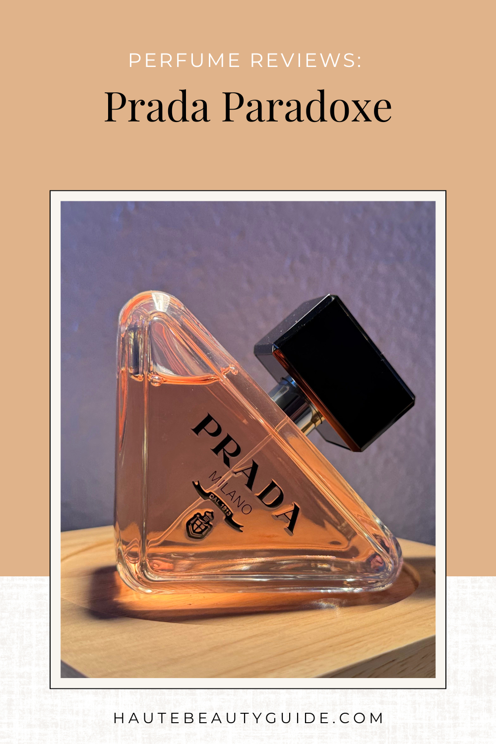 prada paradoxe perfume bottle on a wood shelf with the title of the article written above.