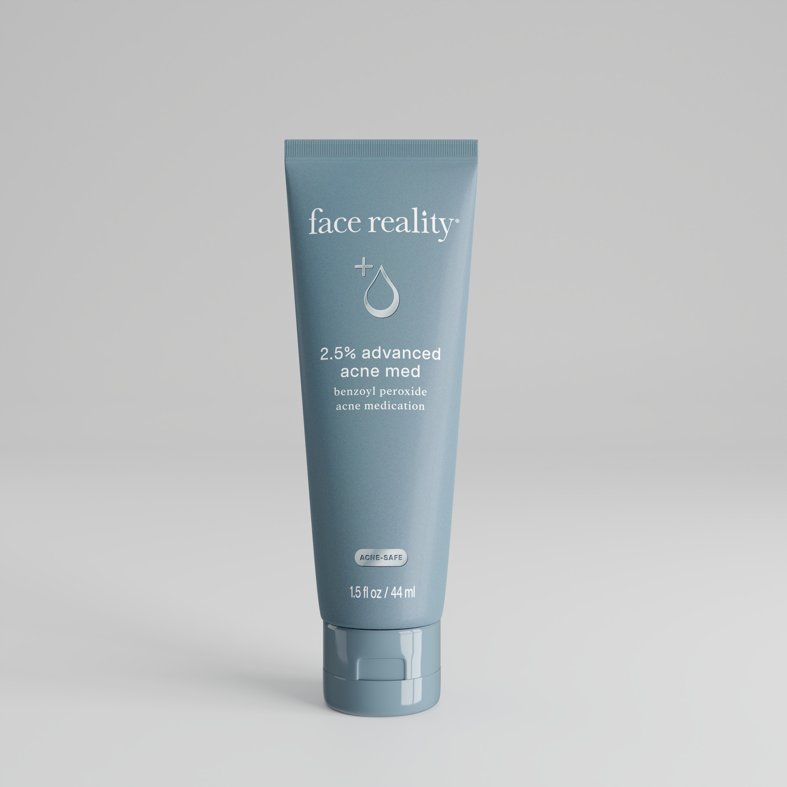 Tube of 'face reality' 5% advanced acne med on a gray background