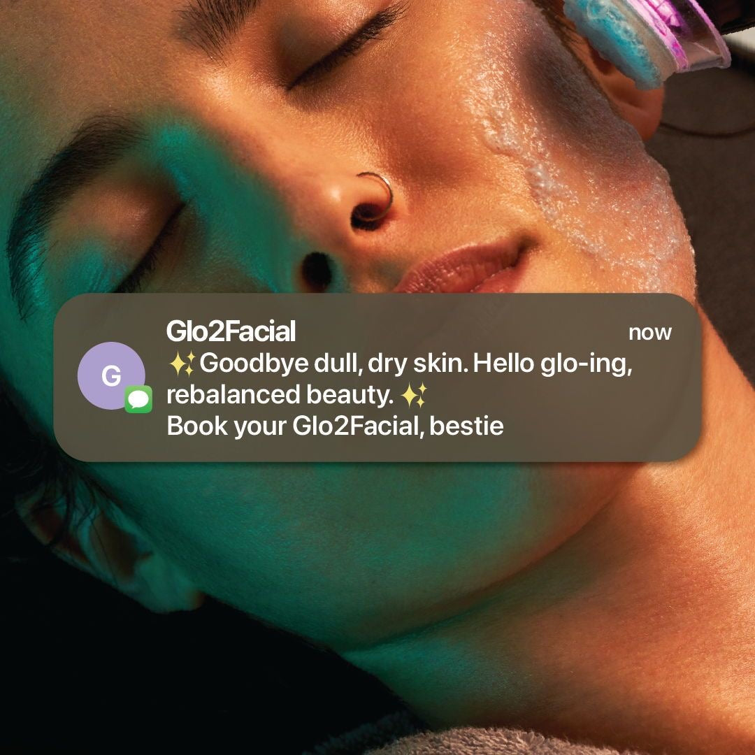 woman recieving a glo2facial.  text says goodbye dull, dry skin.  hello glo-ing rebalanced beauty.  book your glo2facial, bestie.
