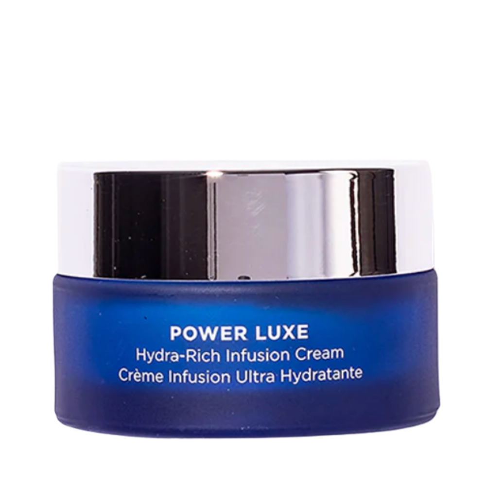 Blue jar of Power Luxe Hydra-Rich Infusion Cream with silver lid on a white background