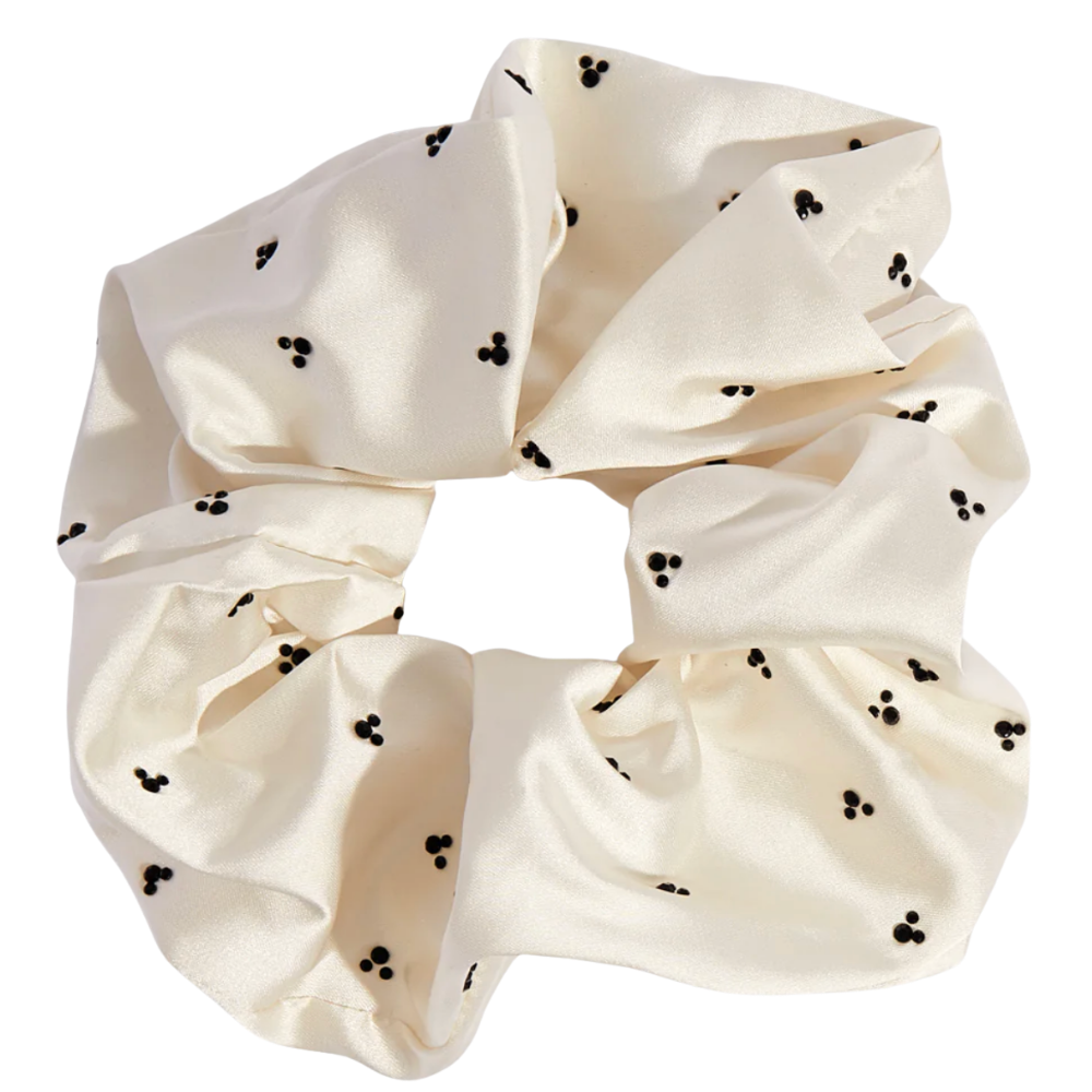 White scrunchie with black Mickey head pattern on a white background